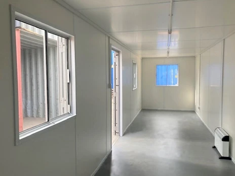 EARL-Interieur-du-container-bureau-de-30-pieds-isole-en-melamine.webp EARL-Interieur-du-container-bureau-de-30-pieds-isole-en-melamine.webp